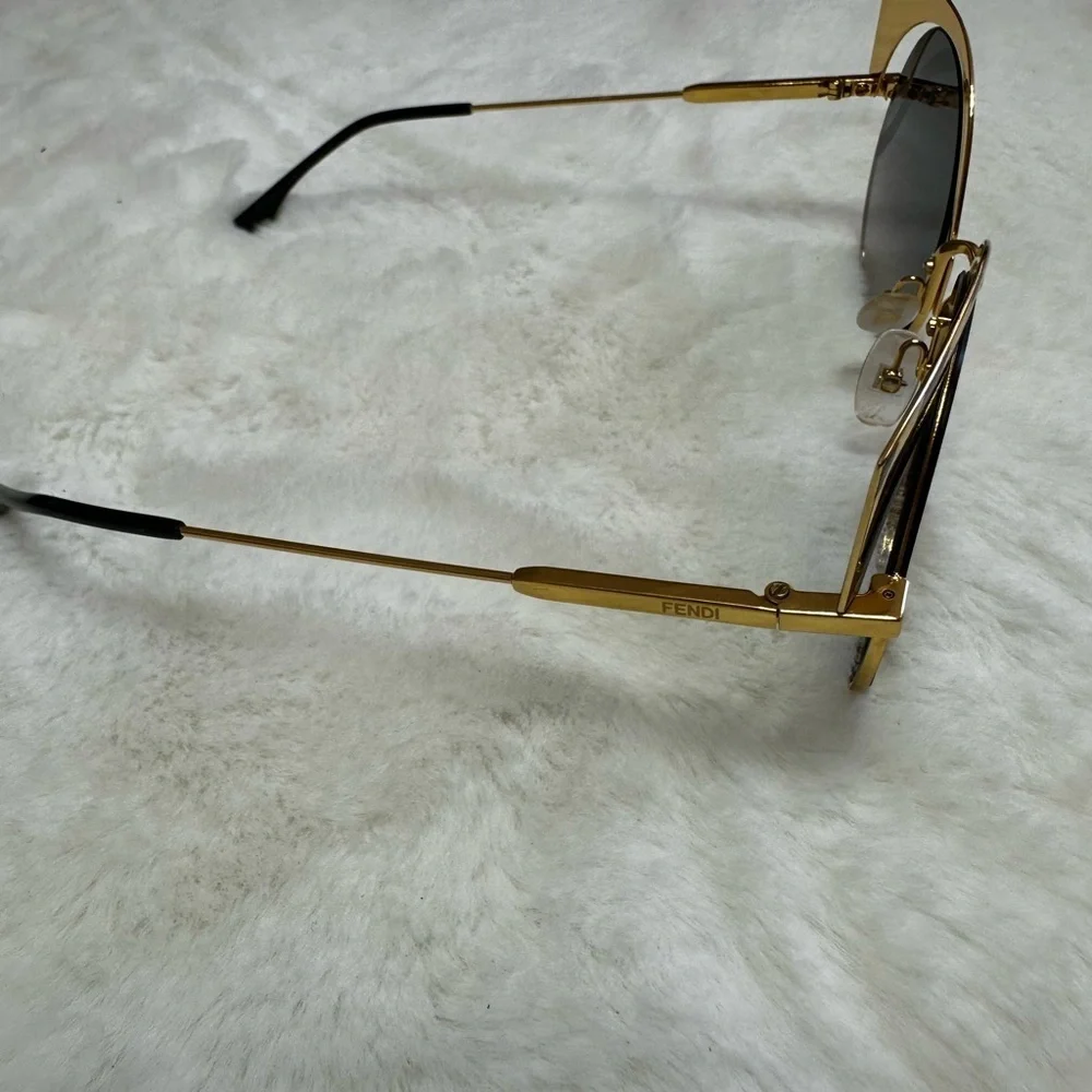 Fendi Stylish Gold Sunglasses case included